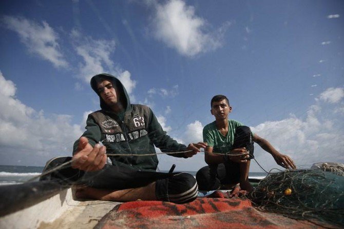 Occupied Palestine: Israel reduces Gaza fishing zone in reprisal for protests