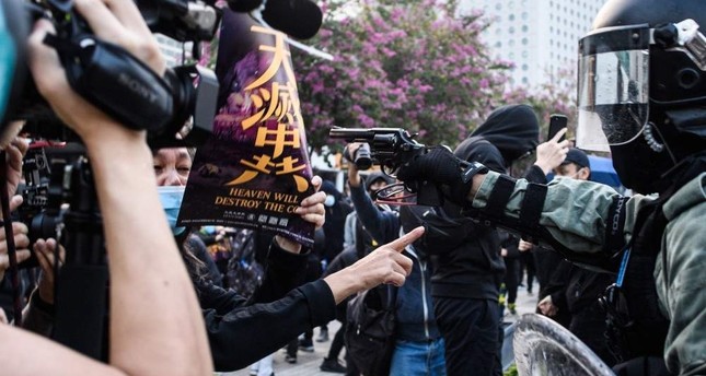 Security forces break up Hong Kong rally for China's ethnic Uighurs